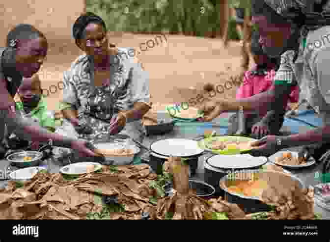 A Group Of People Eating Together In Africa The Global Etiquette Guide To Africa And The Middle East: Everything You Need To Know For Business And Travel Success