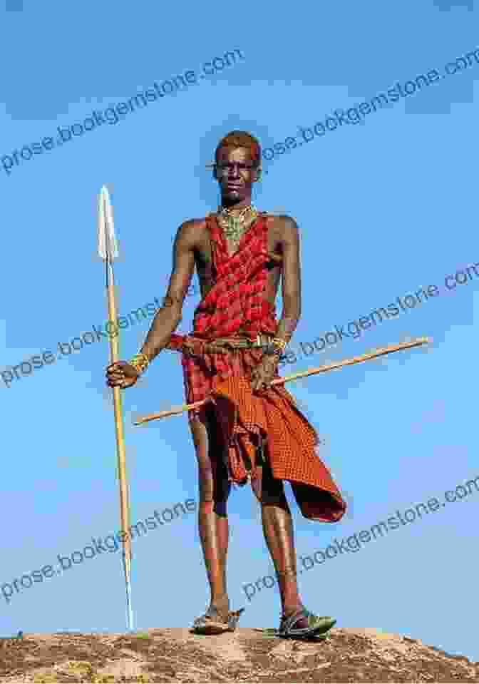 Eric Walters, A Maasai Warrior, Wearing A Traditional Maasai Garment And Holding A Spear, Standing In Front Of The Hollywood Walk Of Fame. Beverly Hills Maasai Eric Walters