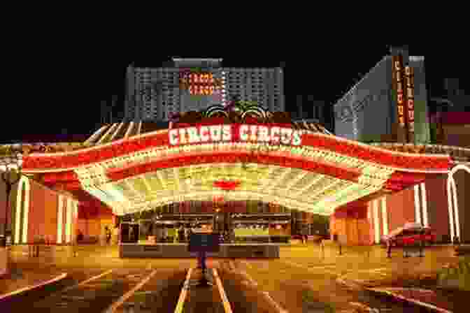 The Circus Circus Hotel And Casino, Its Colorful Facade Illuminated Against The Night Sky, With A Ghostly Clown Lurking In The Shadows Haunted Las Vegas (Haunted America)